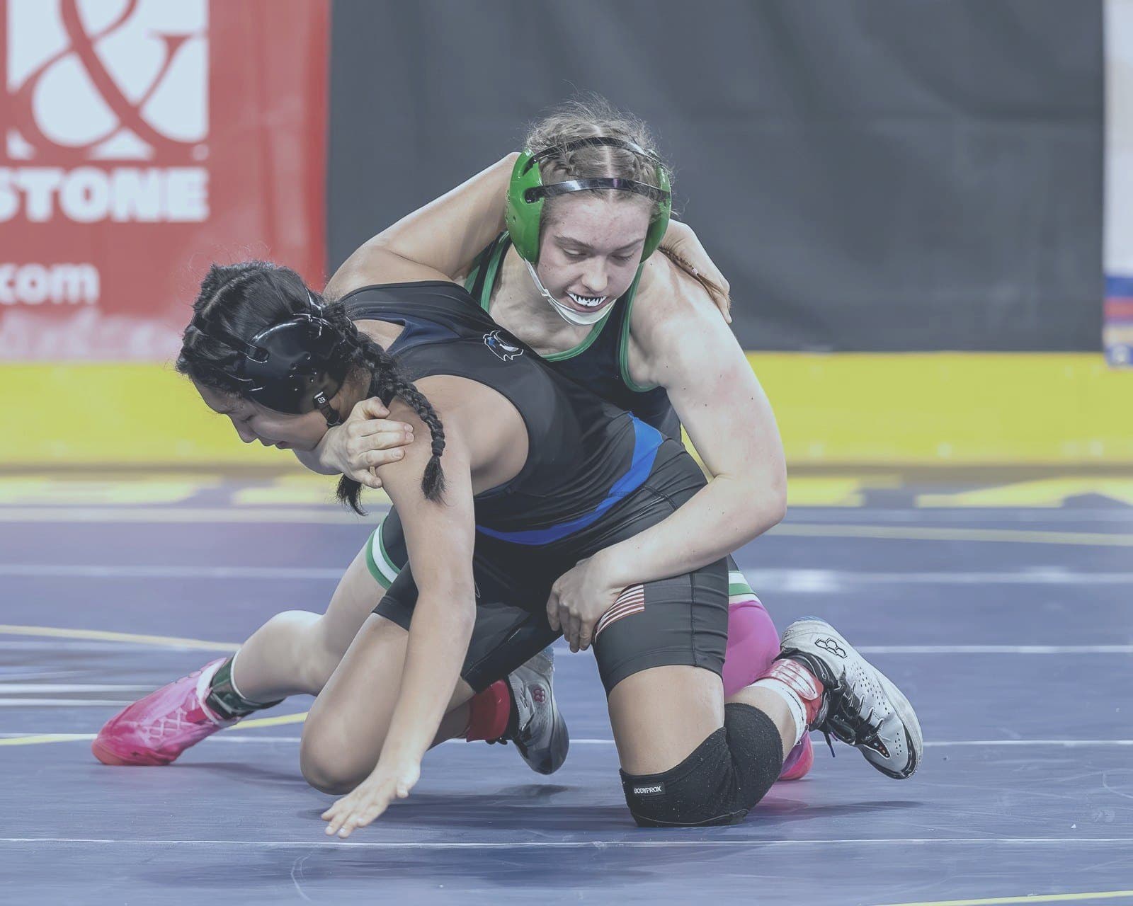 Women's wrestler drives opponent down at state tournament