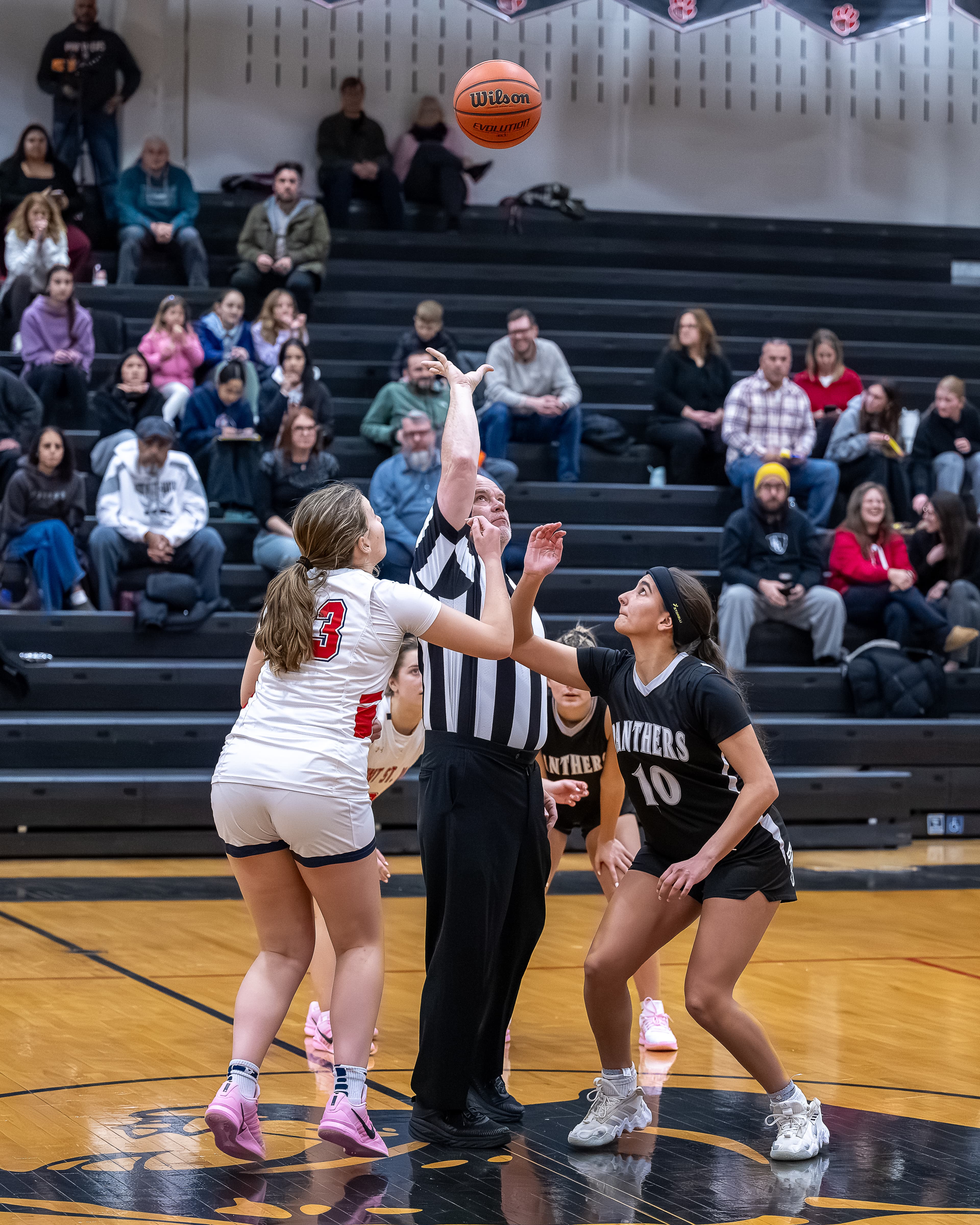 Post player seals position under the basket