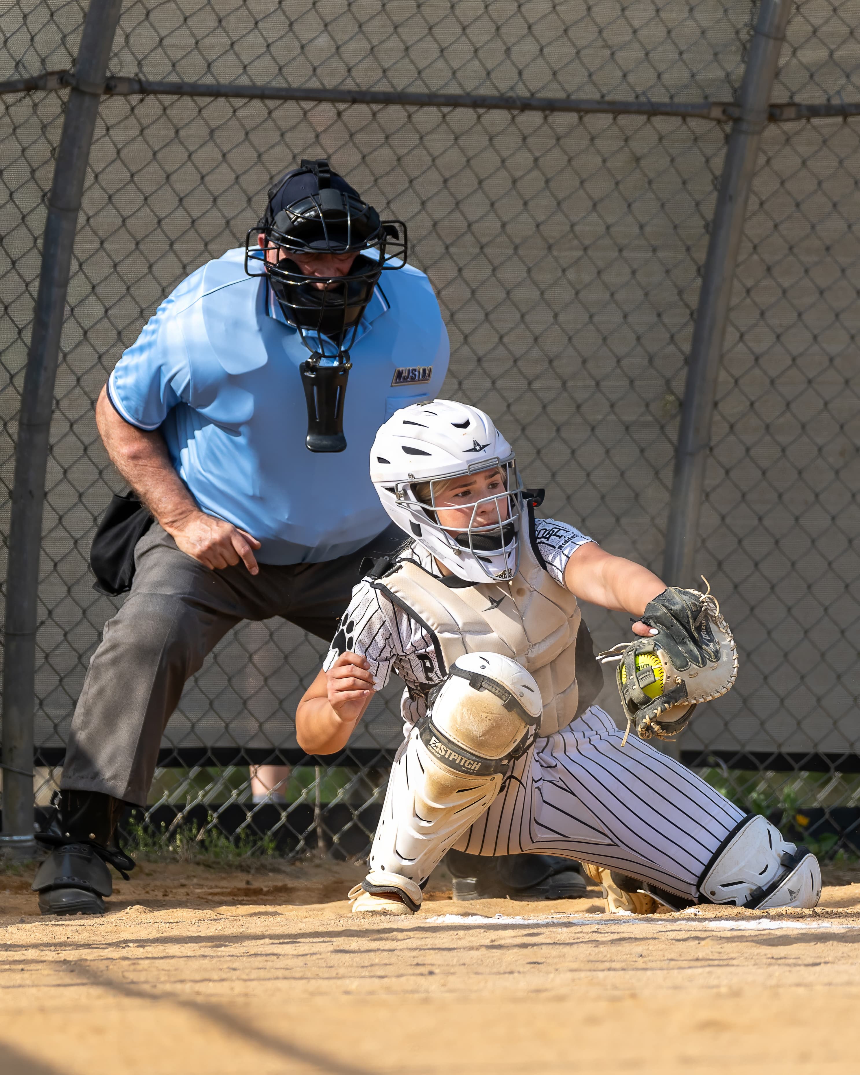 Catcher frames a called strike