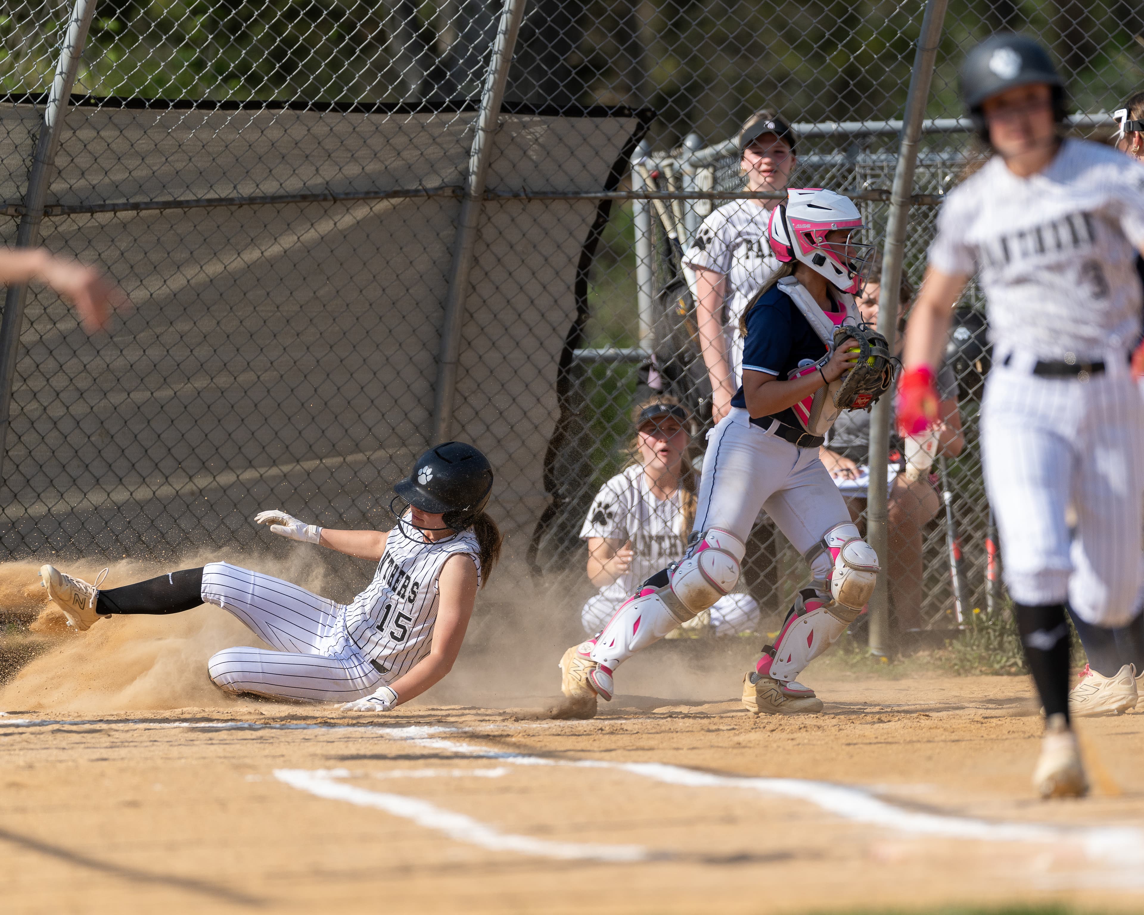 Walk-off celebration — teammates swarm the winner