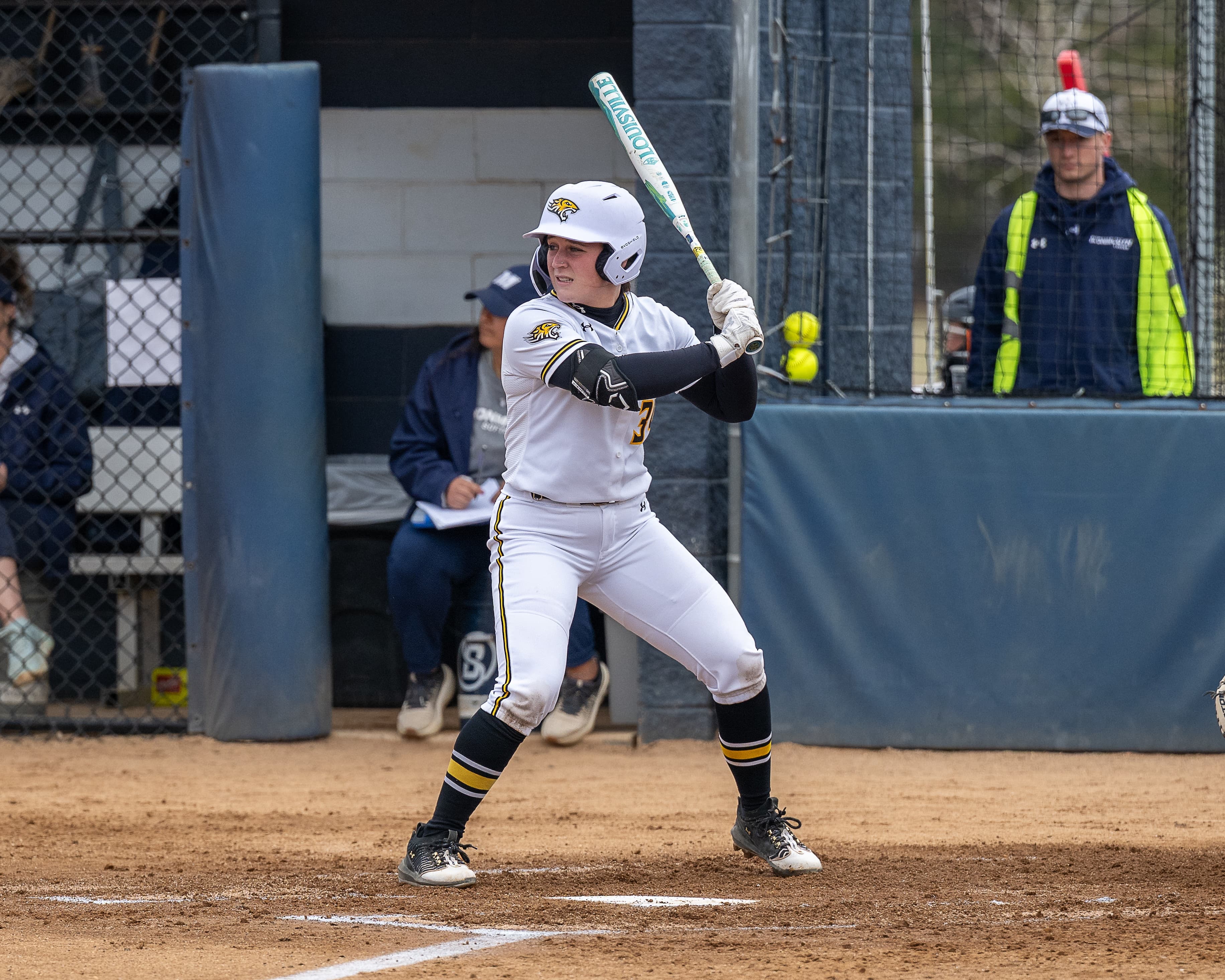 First baseman stretches for a throw in the dirt